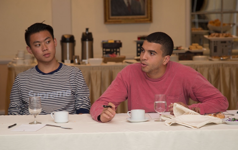 Juniors Daniel Liu, left, and Anid Laoui, right, listened to a talk by Ro Gupta, founder and chief executive of a new company called Carmera and a 2000 Princeton alumnus, at one of the program's evening events.