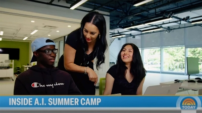 Photo of Morgan Radford of NBC News speaks with AI4All students Kojo Barwuah and Michele Welson