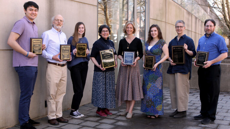 Cole Hullfish, Daniel Marlow, Teresa Lee, Donna Gabai, Penelope Georges, Charlotte Cathcart, Claire Gmachl and Craig Arnold holding their award plaques.