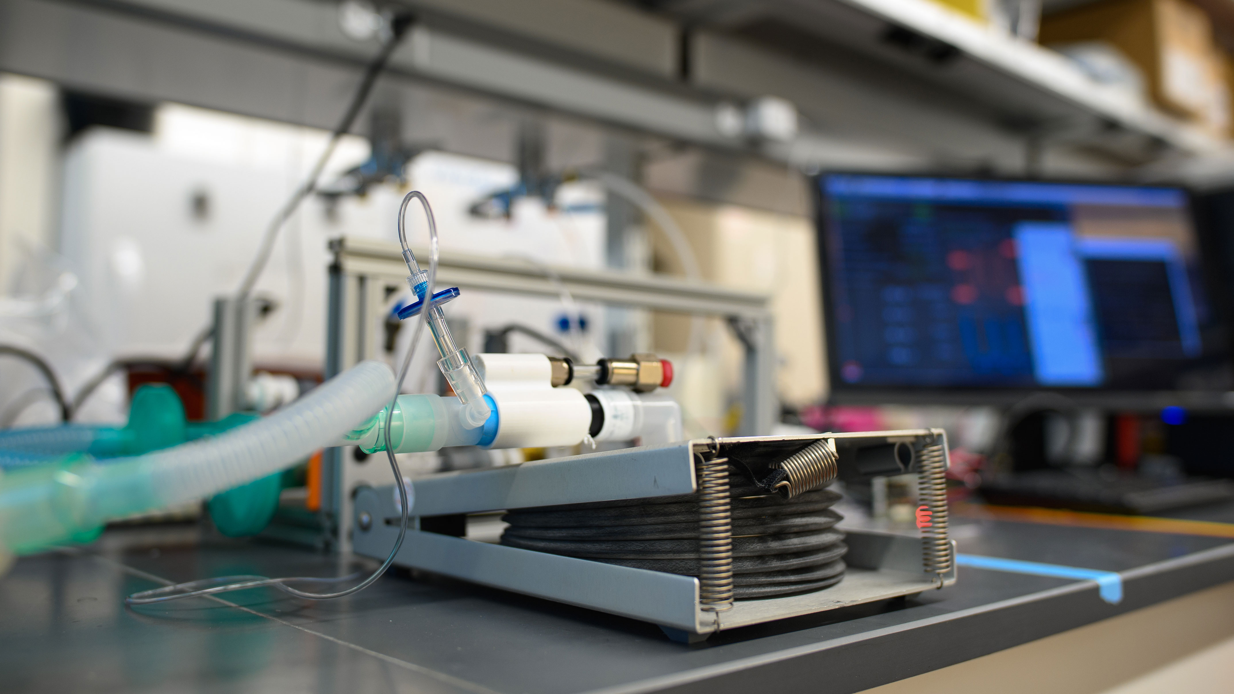 Ventilator in front of a computer in a lab